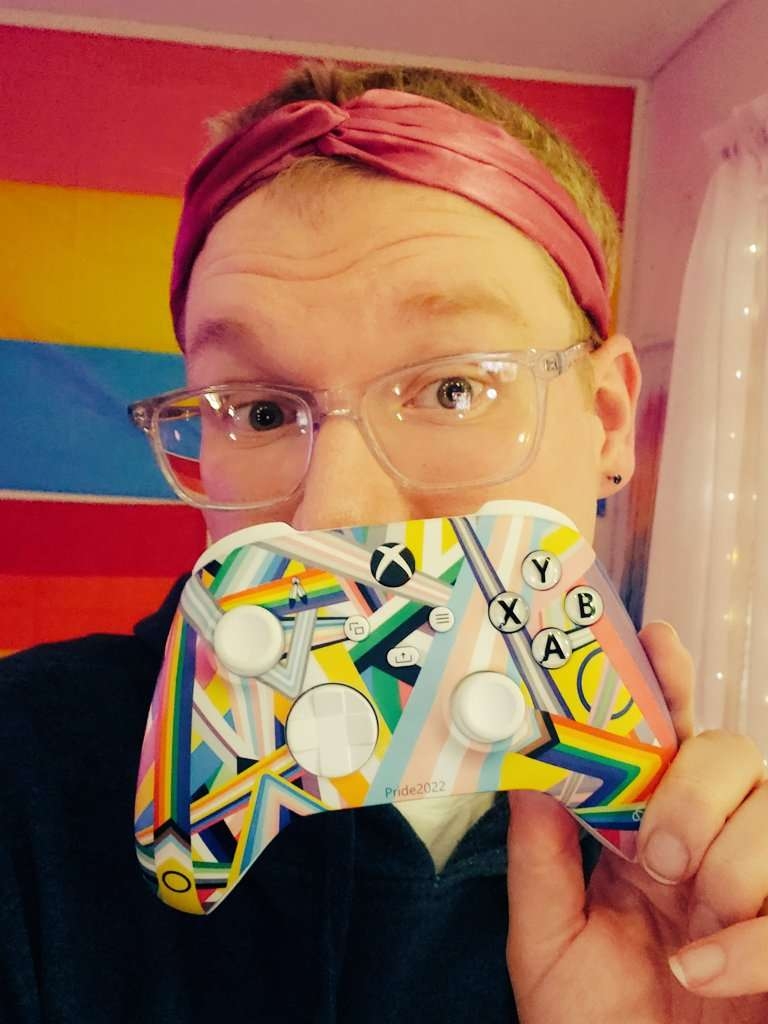 A profile picture of ItsMileyGirl holding the Pride Flag Xbox controller.