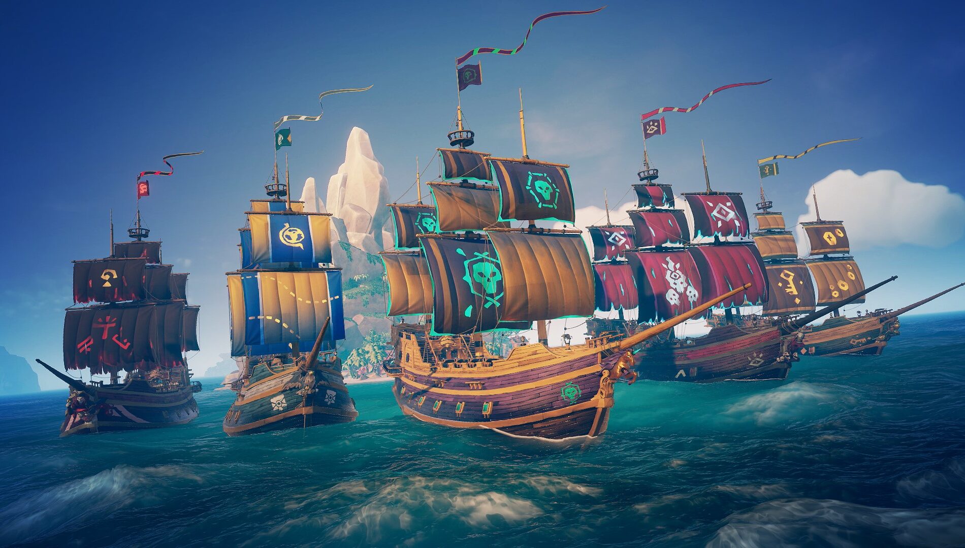 Key Art zu „Sea of Thieves“, die mehrere Piratenschiffe mit bunten Fraktionssegeln zeigt, die gemeinsam unter strahlend blauem Himmel über den Ozean in der Nähe einer tropischen Insel segeln.